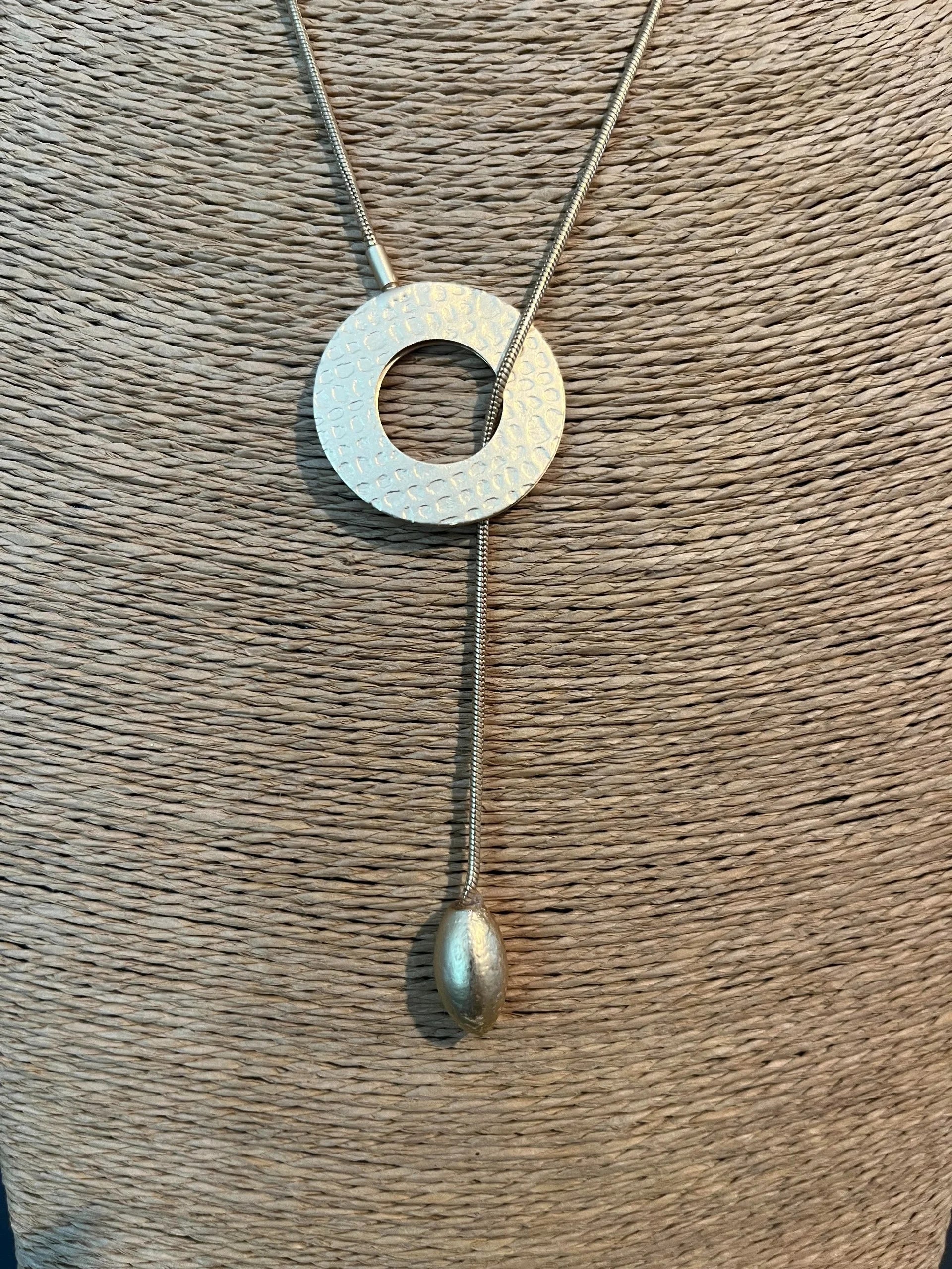 A Hole In One necklace